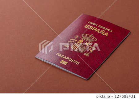 Spain passport for travelling, flying and doing business. Spanish document 127688431