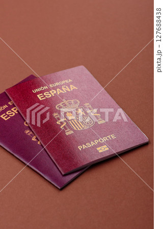Spain passport for travelling, flying and doing business. Spanish document 127688438