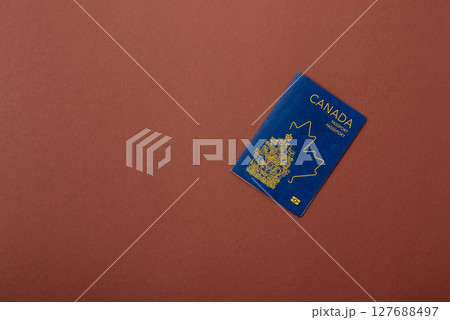 Canadian passport for travelling, flying and doing business. Canada document 127688497