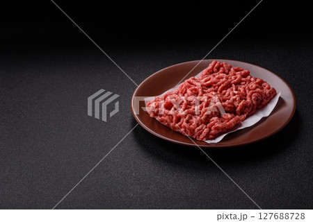 Stuffing or ground raw beef or pork with salt and spices Stuffing or ground raw beef or pork with salt and spices 127688728