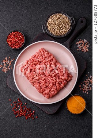 Stuffing or ground raw beef or pork with salt and spices Stuffing or ground raw beef or pork with salt and spices 127688773