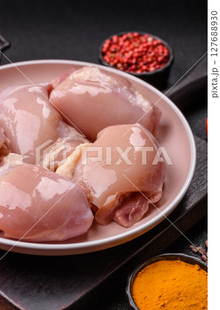 Chicken thigh fillet raw, skinless, boneless, poultry legs Chicken thigh fillet raw, skinless, boneless, poultry legs 127688930