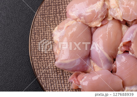 Chicken thigh fillet raw, skinless, boneless, poultry legs 127688939