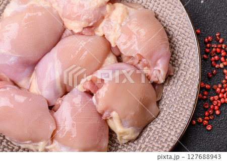 Chicken thigh fillet raw, skinless, boneless, poultry legs Chicken thigh fillet raw, skinless, boneless, poultry legs 127688943