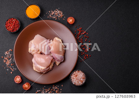 Chicken thigh fillet raw, skinless, boneless, poultry legs 127688963