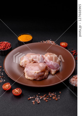 Chicken thigh fillet raw, skinless, boneless, poultry legs Chicken thigh fillet raw, skinless, boneless, poultry legs 127688965