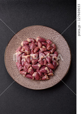 Chicken raw heart, red duck or turkey internal organs as an ingredient 127689033