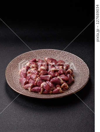 Chicken raw heart, red duck or turkey internal organs as an ingredient 127689034