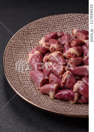 Chicken raw heart, red duck or turkey internal organs as an ingredient 127689038