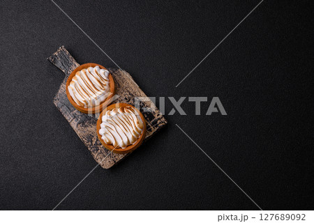 Lemon tart, meringue pie or fruit cream tart Lemon tart, meringue pie or fruit cream tart 127689092