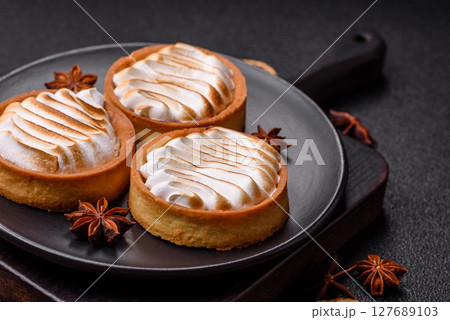 Lemon tart, meringue pie or fruit cream tart 127689103