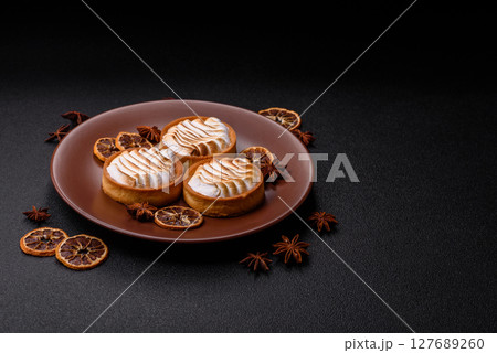 Lemon tart, meringue pie or fruit cream tart Lemon tart, meringue pie or fruit cream tart 127689260