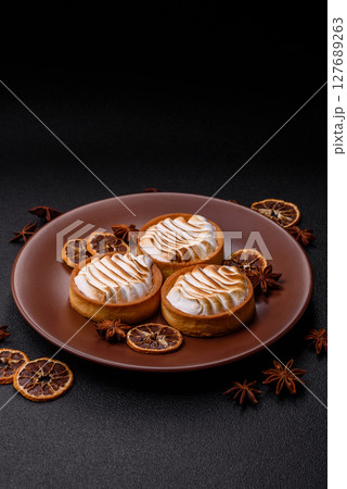 Lemon tart, meringue pie or fruit cream tart Lemon tart, meringue pie or fruit cream tart 127689263