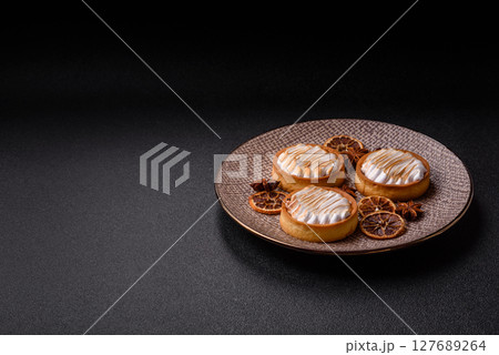 Lemon tart, meringue pie or fruit cream tart Lemon tart, meringue pie or fruit cream tart 127689264