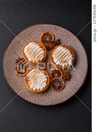 Lemon tart, meringue pie or fruit cream tart Lemon tart, meringue pie or fruit cream tart 127689266