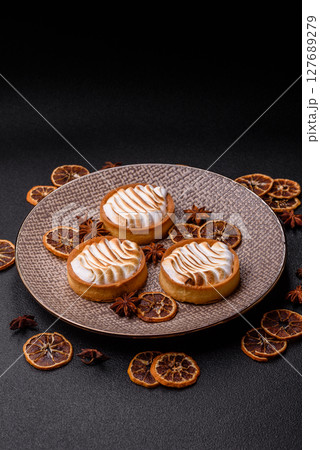 Lemon tart, meringue pie or fruit cream tart Lemon tart, meringue pie or fruit cream tart 127689279
