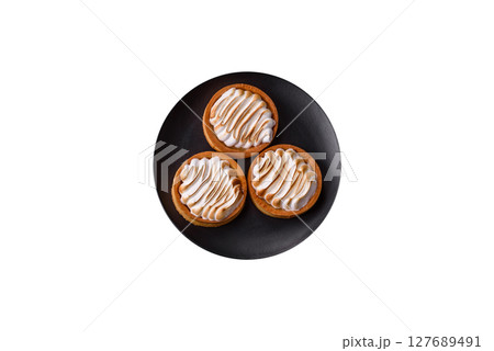 Lemon tart, meringue pie or fruit cream tart Lemon tart, meringue pie or fruit cream tart 127689491