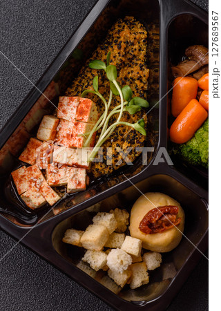 Food bowl with tofu, quinoa, broccoli and carrots, microgreens Food bowl with tofu, quinoa, broccoli and carrots, microgreens 127689567