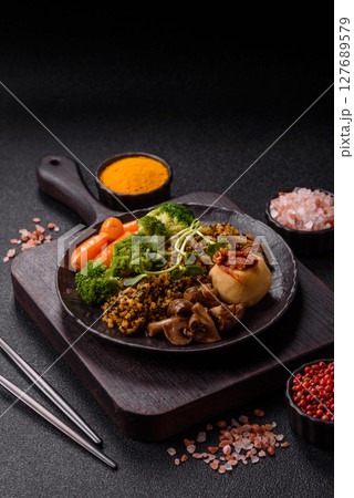 Food bowl with tofu, quinoa, broccoli and carrots, microgreens Food bowl with tofu, quinoa, broccoli and carrots, microgreens 127689579