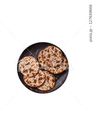 Matzah wheat bread for the Jewish holiday of passover. Kosher matzo bread Matzah wheat bread for the Jewish holiday of passover. Kosher matzo bread 127689666