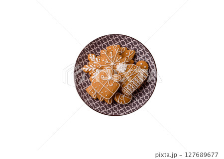 Christmas winter gingerbread, holiday biscuits on monochrome background Christmas winter gingerbread, holiday biscuits on monochrome background 127689677