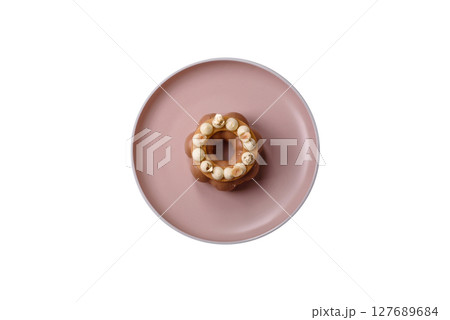 Round chocolate tart or pie with cream berry filling 127689684