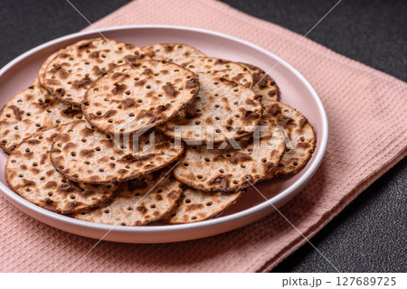 Matzah wheat bread for the Jewish holiday of passover. Kosher matzo bread Matzah wheat bread for the Jewish holiday of passover. Kosher matzo bread 127689725