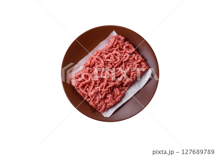 Stuffing or ground raw beef or pork with salt and spices Stuffing or ground raw beef or pork with salt and spices 127689789