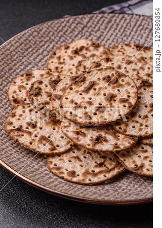 Matzah wheat bread for the Jewish holiday of passover. Kosher matzo bread 127689854