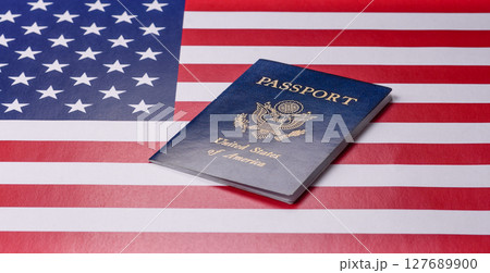 American passport against the background of the US national flag 127689900