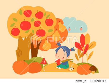 Cute girl reading book under apple tree in autumn garden 127690913