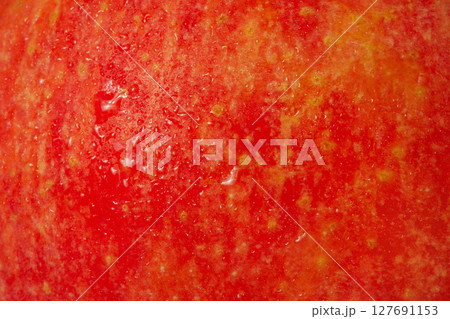 Texture of red and yellow apples as a background. 127691153