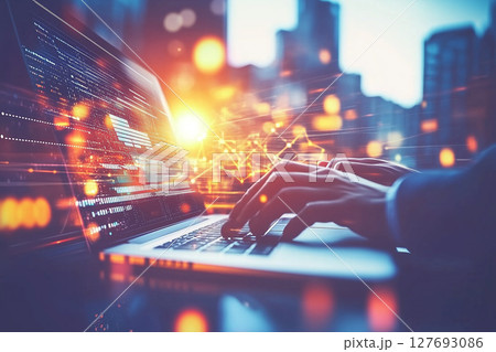 Diverse Employees Engaged in an Online Meeting with Laptop in a Modern Urban Setting 127693086