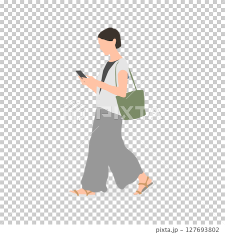 スマホを見ながら歩く若い女性 127693802