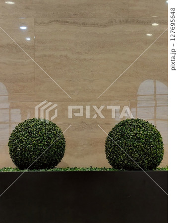 decorative green spheres in modern indoor setting marble background and stylish design elements. 127695648