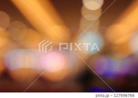 Warm and colorful bokeh lights create an abstract festive atmosphere background 127696766