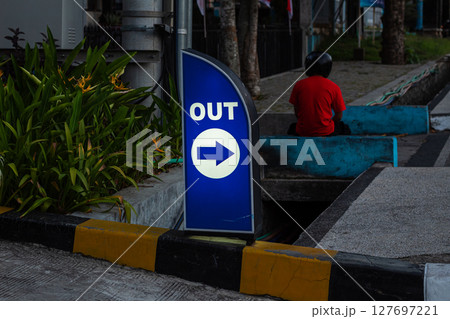 Blue OUT Direction Sign With Right Arrow Blue OUT Direction Sign With Right Arrow 127697221