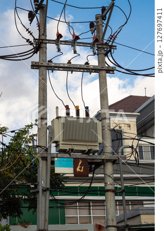 Urban Power Distribution: Transformer on Utility Pole Urban Power Distribution: Transformer on Utility Pole 127697411