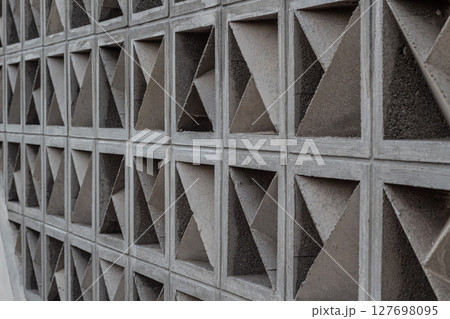 Textured Concrete Facade - Repetitive Geometric Pattern 127698095