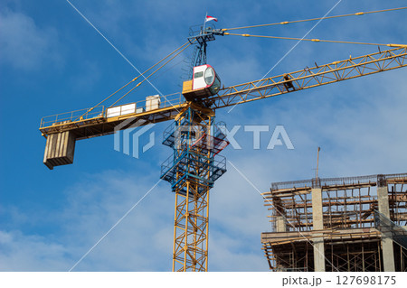 Crane with National Flag at Construction Area - Development in Indonesia 127698175