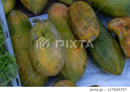 Fresh Papayas Pile at Tropical Market Fresh Papayas Pile at Tropical Market 127698787