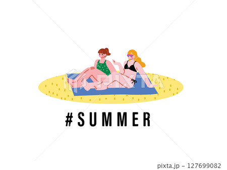 ビーチでくつろぐ女の子 127699082