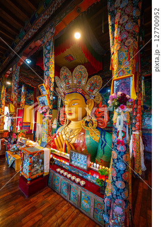 Beautiful and respectful golden buddha statue at Thiksey monastery Beautiful and respectful golden buddha statue at Thiksey monastery 127700952