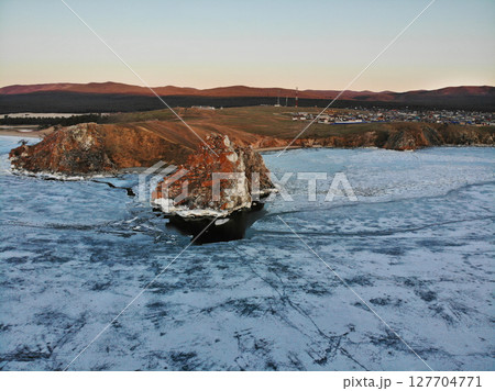 Aerial view of the village of Khuzhir, Olkhon Island, Cape Burkhan or Shamanka Rock. Aerial view of the village of Khuzhir, Olkhon Island, Cape Burkhan or Shamanka Rock. 127704771