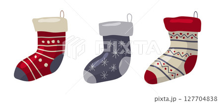 Colorful decorative socks displayed in festive arrangement for holiday celebration 127704838
