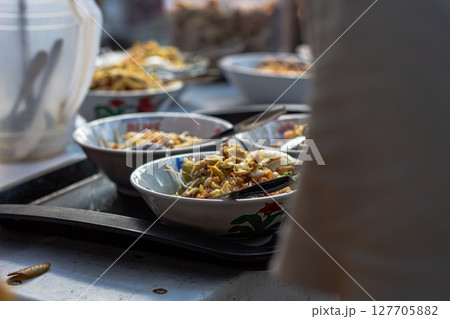 Savory Soto Ayam Dish with Various Toppings 127705882