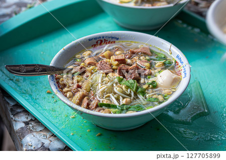 Close up of Traditional Indonesian Beef Soto Soup at Mataram, Lombok, Indonesia - September 1, 2024 127705899