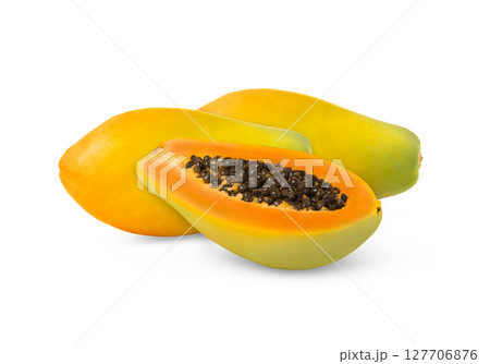 Two colorful papaya fruits and a cut in half isolated. 127706876
