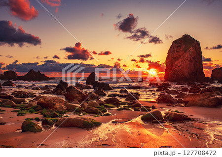 Praia da Ursa beach, Sintra-Cascais Natural Park, Portugal, cliffs in the sea at sunset 127708472