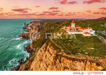 View of the Cabo da Roca Lighthouse at sunset. Sintra, Portugal. 127708504